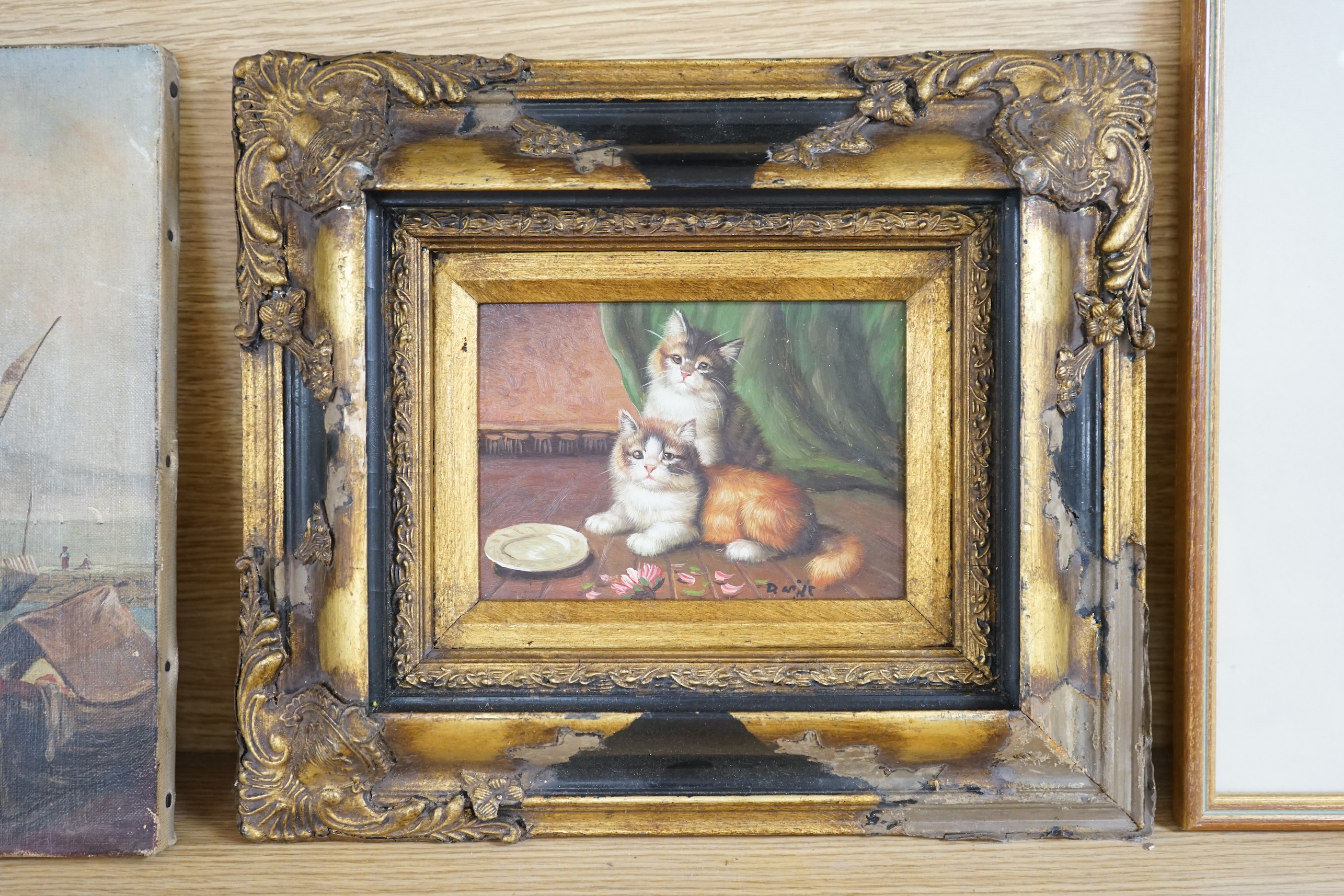 After Henrietta Ronner, contemporary oil on board, Study of two cats, indistinctly signed, 11.5 x 16.5cm, housed in an ebonised and gilt frame. Condition - good, frame poor